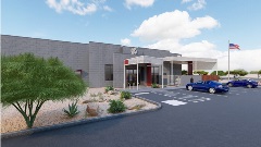 Front view of Scottsdale Fire Station 612 with red garage doors and a modern design.