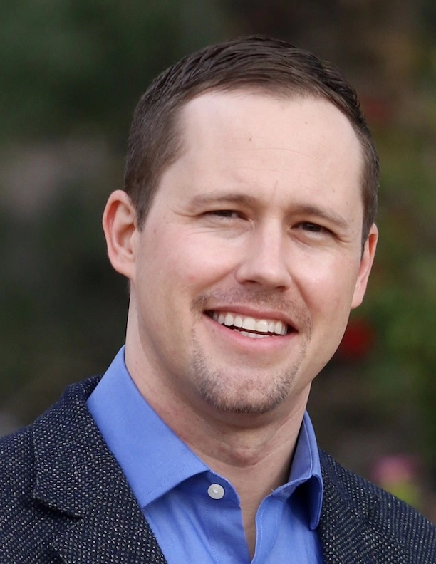 Outdoor portrait of councilmember Barry Graham.