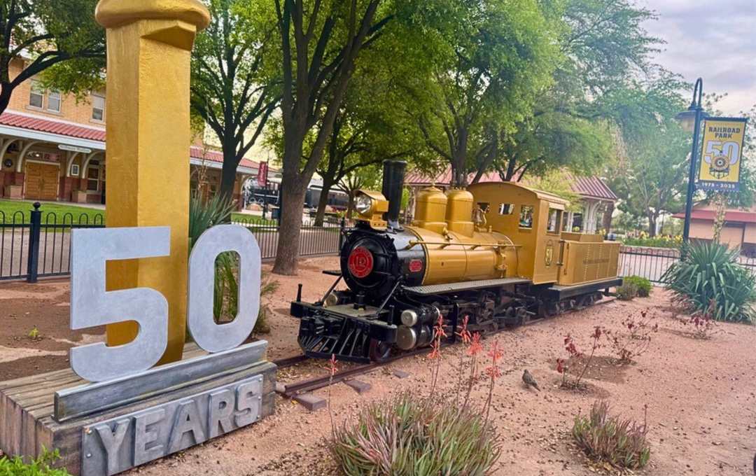 News image sculpture that 50 years in front a human-sized model train